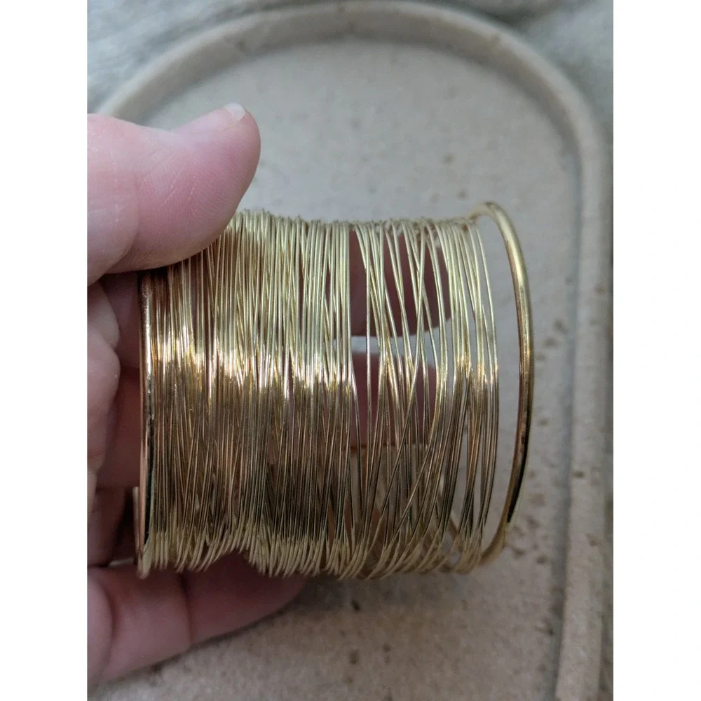Strand gold tone